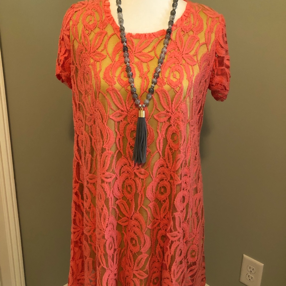 Lace dress by Uncle Frank